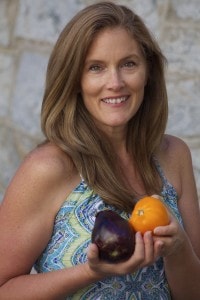 Jennifer holding fresh produce